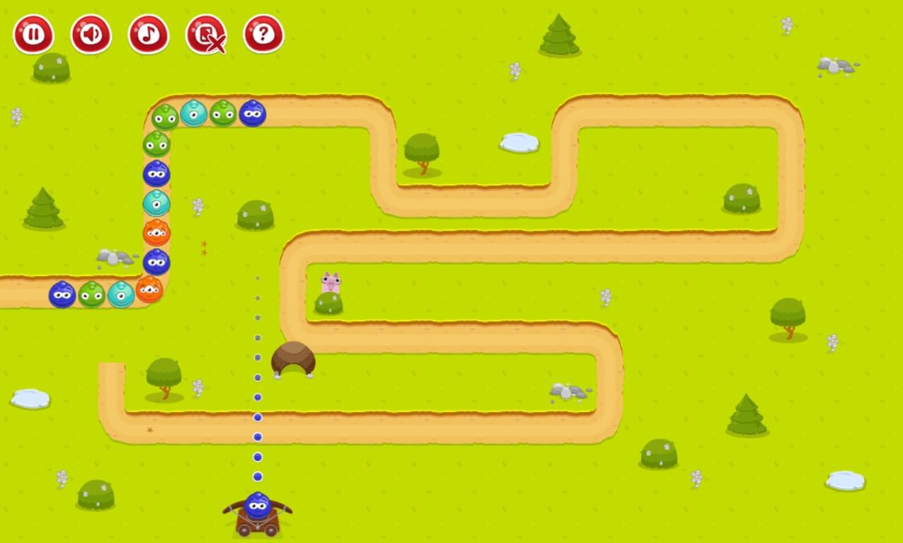Bubble Defence 1 Robot game on a green background with a winding route and obstacles.