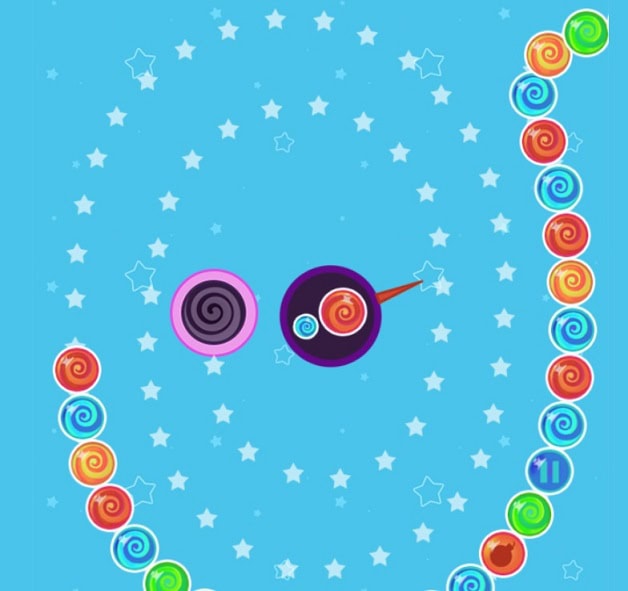 Candy Zuma 1 Space scene with a rocket and planets against a starry background.