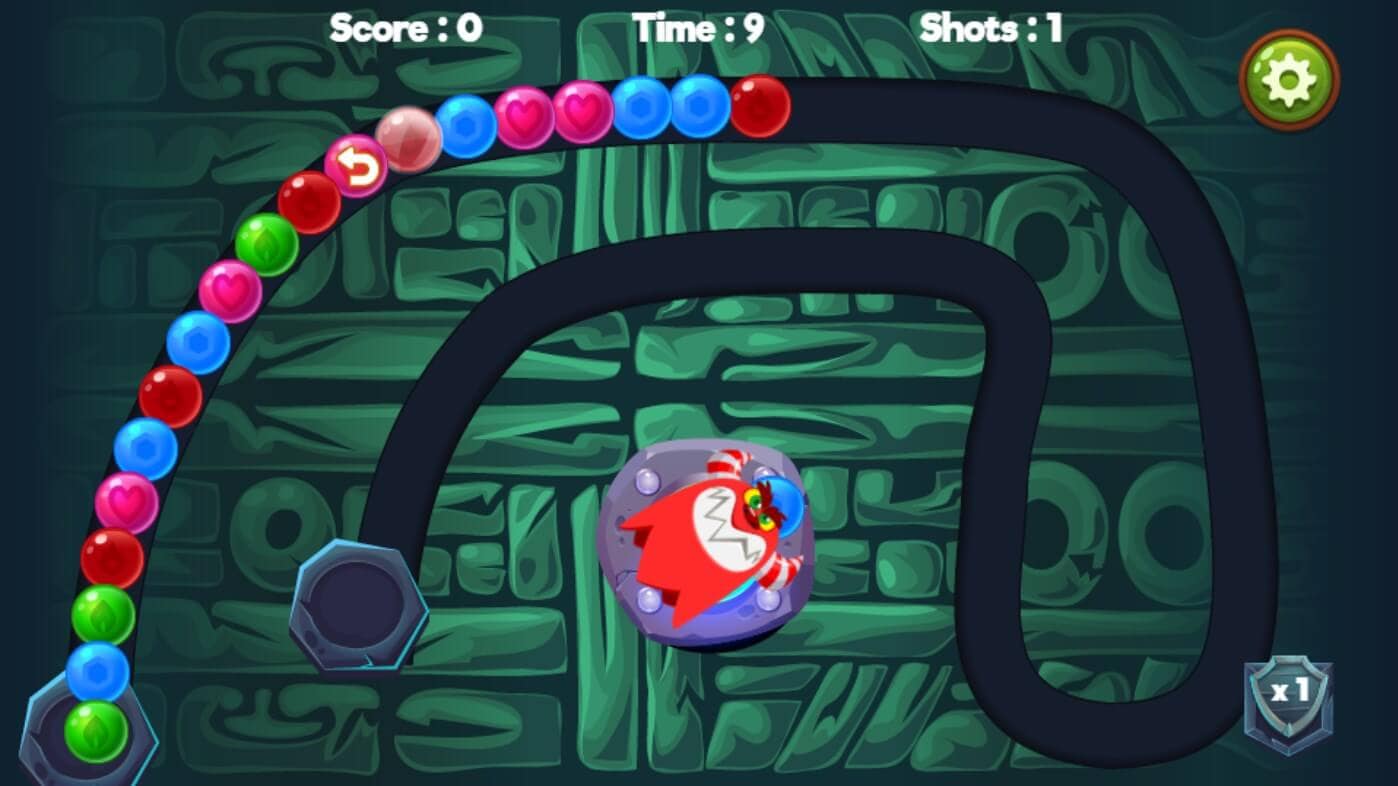 Monster Shooter Defense 1 Classic "Snake" game on a smartphone with bright balls.